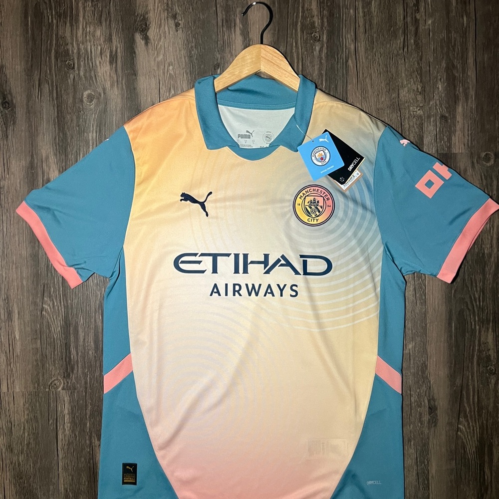 Puma Teal and Pink Football Jersey